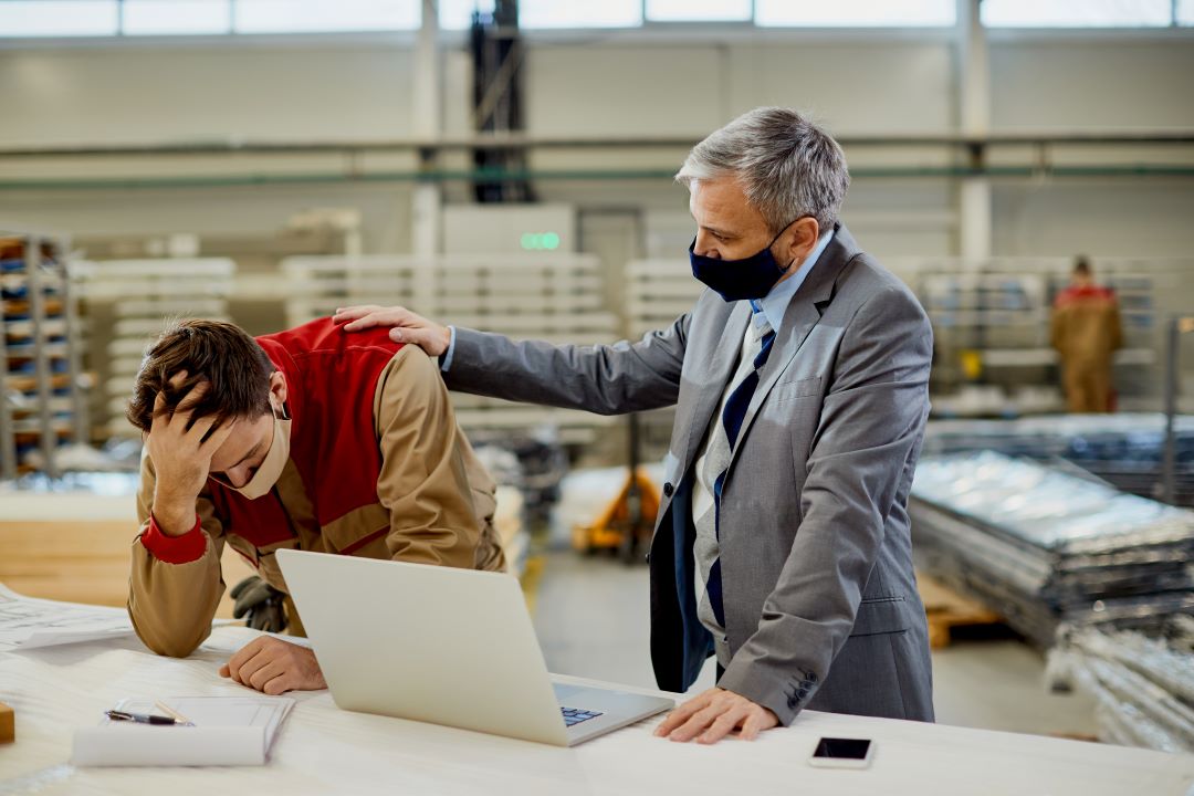 manager helping a colleague with his triggers